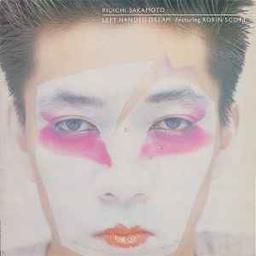 Left handed dream / Ryuichi Sakamoto , claviers, guitare basse, batterie, percussion, chant, production, composition | Sakamoto, Ryūichi (1952-2023). Musicien. Chanteur. Producteur. Compositeur